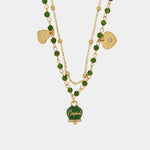 Collana in Metallo multifilo con campanella e pietre verdi