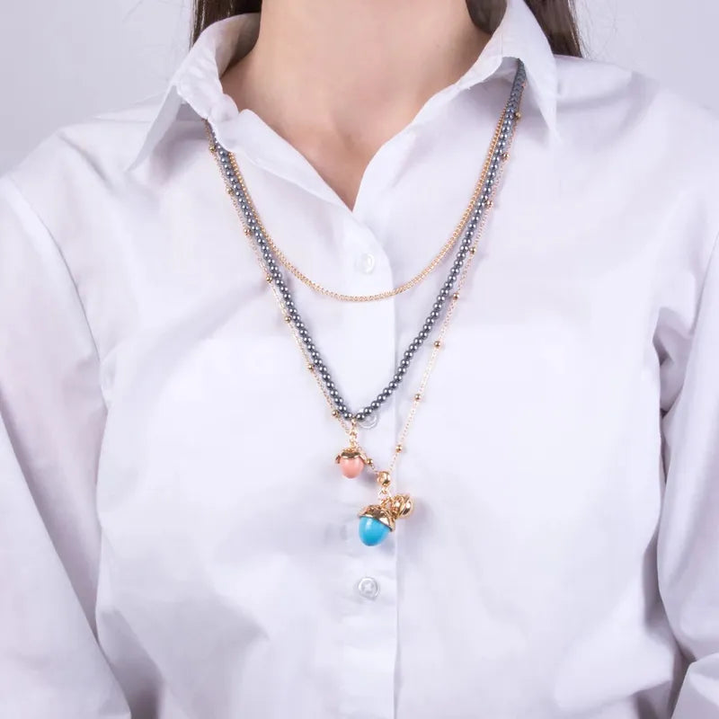 Collana in Metallo multifilo con cristalli e sonaglio pendente