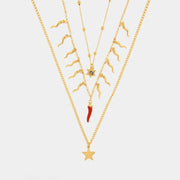 Collana in Metallo pendenti  cornetti rossi e stella