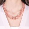 Metal necklace with pink crystals