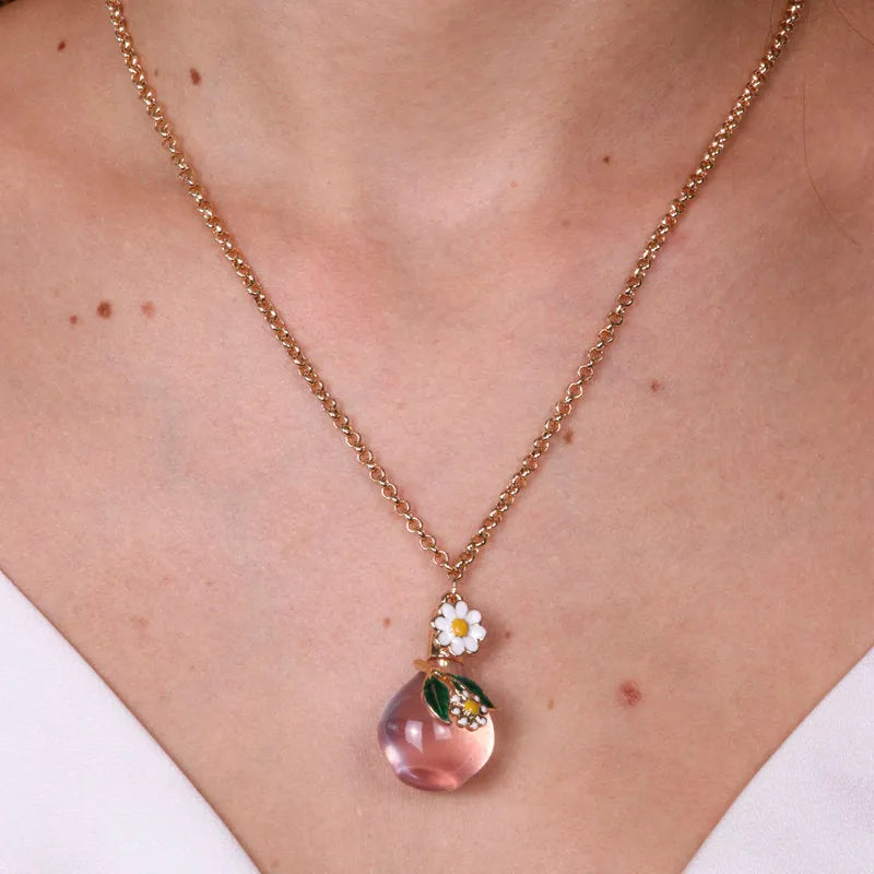 Collana in Metallo con bottiglina e fiori bianchi