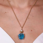 Collana in Metallo con bottiglina con scritta capri