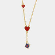 Collana in Metallo con cuore e dado  pendente
