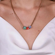 Collana in Metallo con cuore rosso e dadi