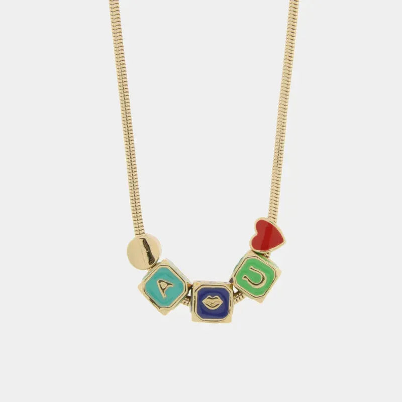 Collana in Metallo con dadi, cuore rosso e perlina