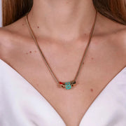 Collana in Metallo con dado turchese e cuore rosso