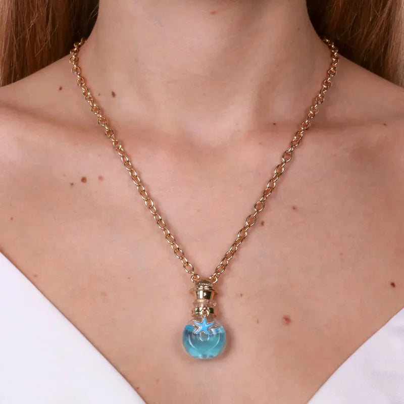 Collana in Metallo con bottiglina e stella marina pendente
