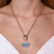 Collana in Metallo con bottiglina e fiore blu pendente