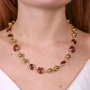 Collana in Metallo con pietre marroni e perle lucide