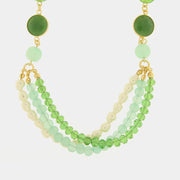Collana in Metallo con perle verdi e multfilo pendente