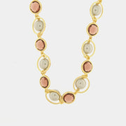 Collana in Metallo con cristalli marrini , cerchi e perle