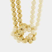 Collana in Metallo con nodo di perle bianche e oro