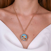 Collana in Metallo con capuzzella azzurra impreziosita da fiori colorati