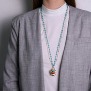 Collana in Metallo multifilo azzurra con campana a fiori multicolor