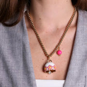 Collana in Metallo con campanella bianca e  fiori e pietra rosa