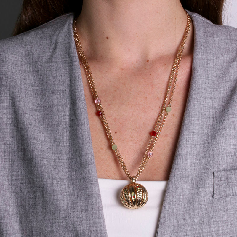 Metal necklace with round pendants and multicolor zircons