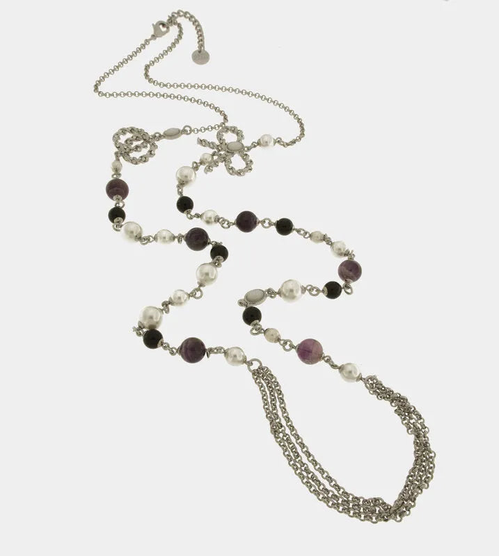 Metal necklace with black and white pearls and multiple strands