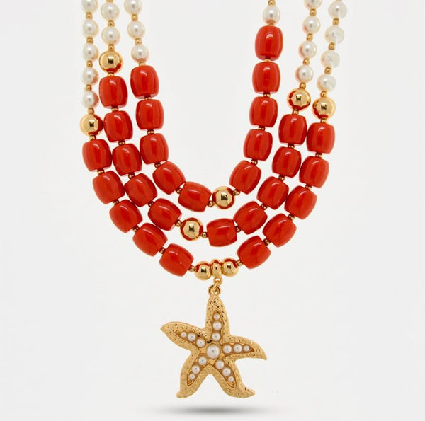 Collana in Metallo conchigla con sfere rosse e bianche BYS - gioiello BySimon