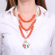 Collana in Metallo conchigla con sfere rosse e bianche