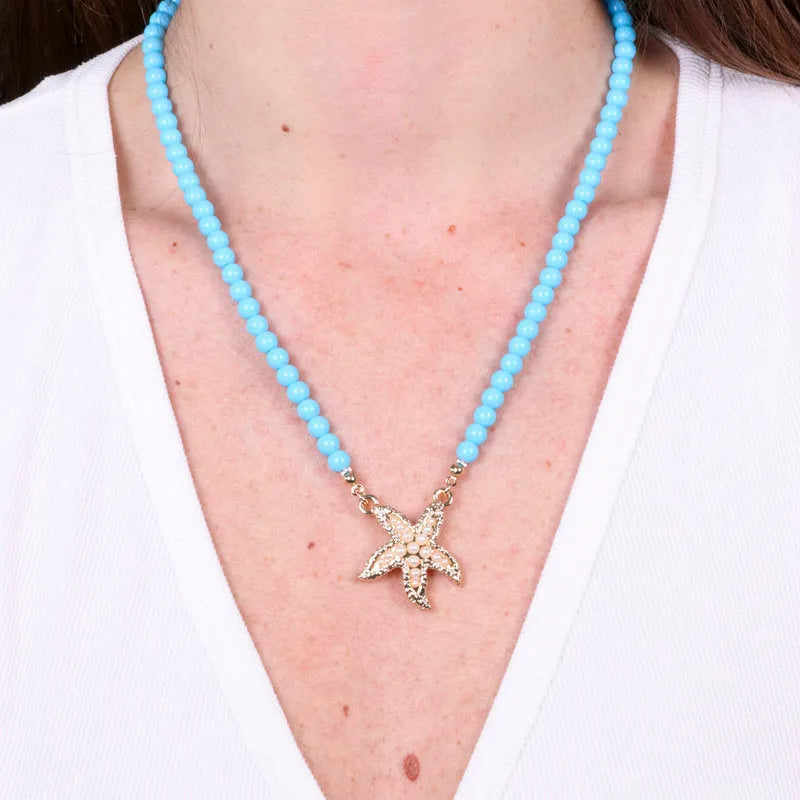 Collana in Metallo sfere turchesi con stella marina bianca BYS - gioiello BySimon