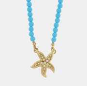 Collana in Metallo sfere turchesi con stella marina bianca