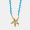 Collana in Metallo sfere turchesi con stella marina bianca