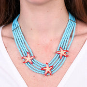 Collana in Metallo multifilo turchesi con stelle marine rosse