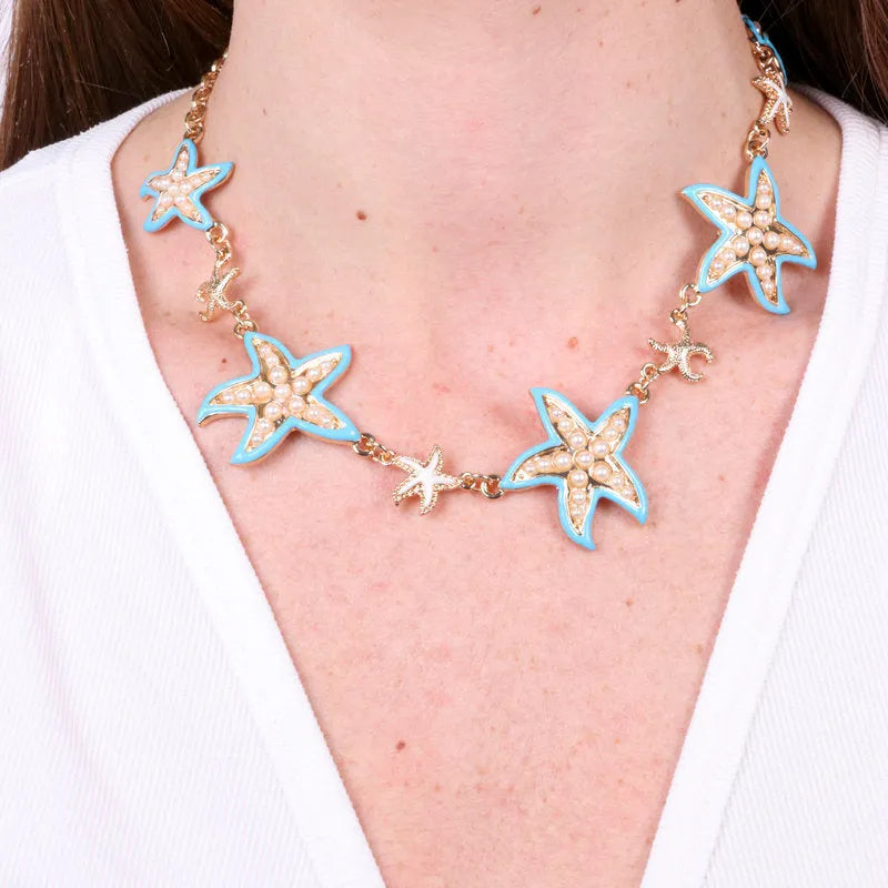 Metal necklace with turquoise and white starfish