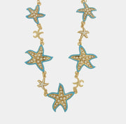 Collana in Metallo con stelle marine turchesi e bianche