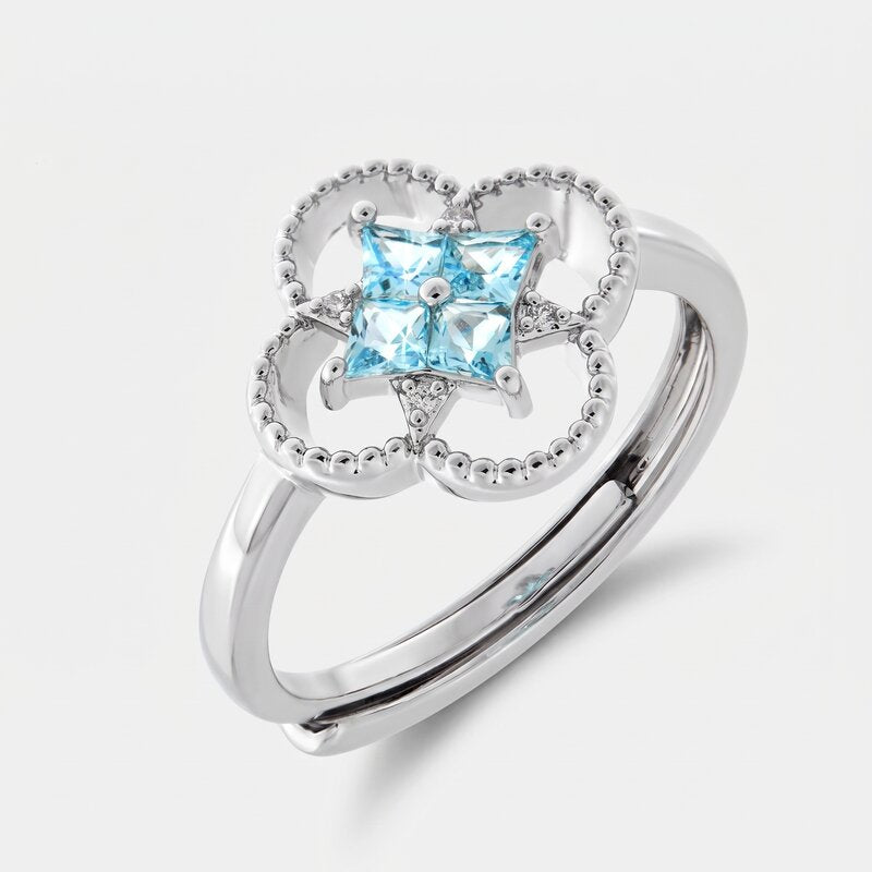 Anello in Metallo fiore zirconato azzurro - BYSIMON gioielli
