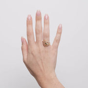 Anello in Metallo cuore intecciato con punto luce verde