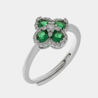 Metal ring with green zircon flower