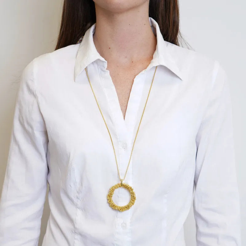 Collana in Metallo cerchio con perline intrecciate