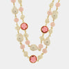 Collana in Metallo mutlifilo con cristalli rosa e perle