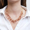 Metal necklace with pink crystals