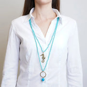 Collana in Metallo multifilo con cristalli verdi ispirati al vetro di Murano e cavalluccio marino