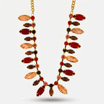 Collana in Metallo cristalli rossi pendenti - BYSIMON gioielli