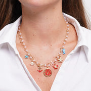 Collana in Metallo con stelle marine, conchiglie, pesciolino, ancora e corallo