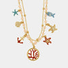 Collana in Metallo con stelle marine, conchiglie, pesciolino, ancora e corallo