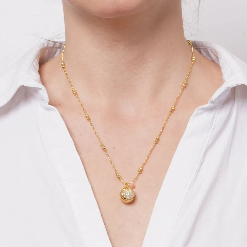Collana in Metallo donna con catena a sfere dorate e pendente sferico centrale dal design bombato