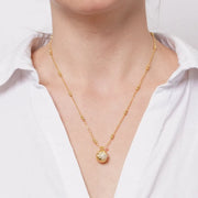 Collana in Metallo donna con catena a sfere dorate e pendente sferico centrale dal design bombato