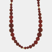 Collana in Metallo lunga sfere rosse