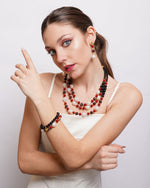 Set coordinato - Collana in Metallo multifilo con sfere rosse e perle
