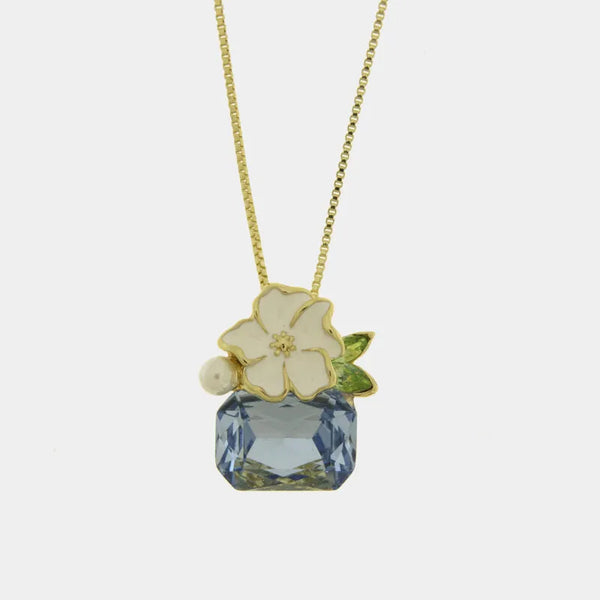 Collana in Metallo fiore bianco e cristallo azzurro - BYSIMON gioielli