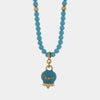 Collana in Metallo con filo di sfere azzurre e campanella con scritta capri