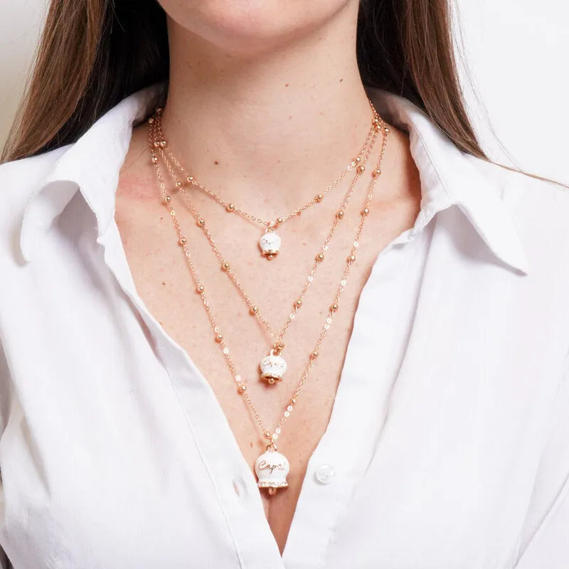 Collana in Metallo multifilo con campanelle bianche di grandezze diverse con cristalli luminosi CAPRI - gioiello BySimon