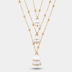 Collana in Metallo multifilo con campanelle bianche di grandezze diverse con cristalli luminosi CAPRI - gioiello BySimon