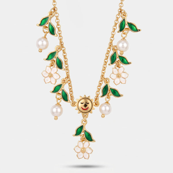 Collana in Metallo catena dorata sole fiori bianchi foglie verdi perle pendenti Capri