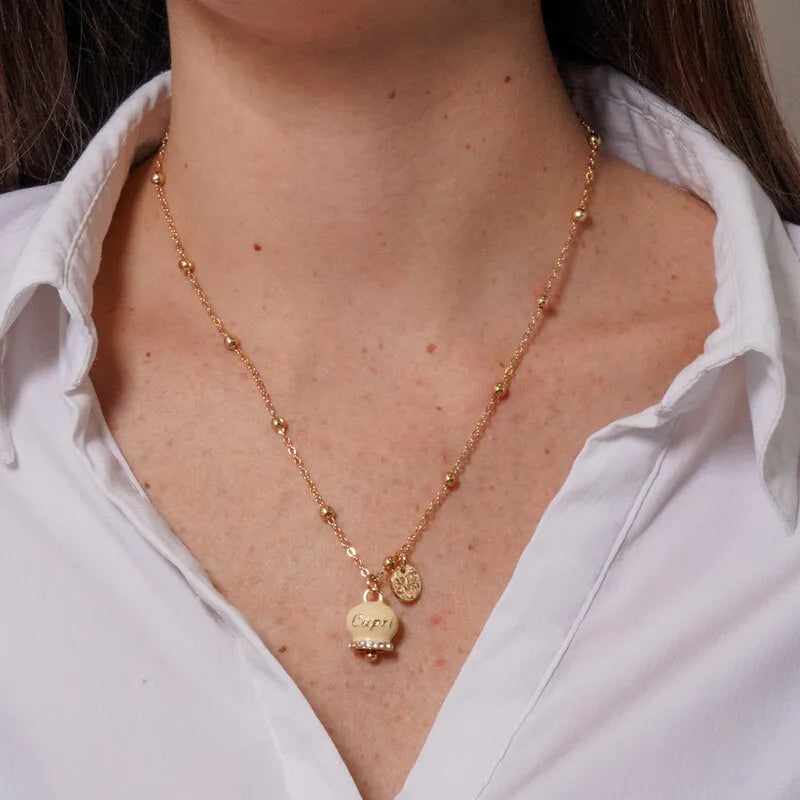 Collana in Metallo con campanella portafortuna crema e cristalli