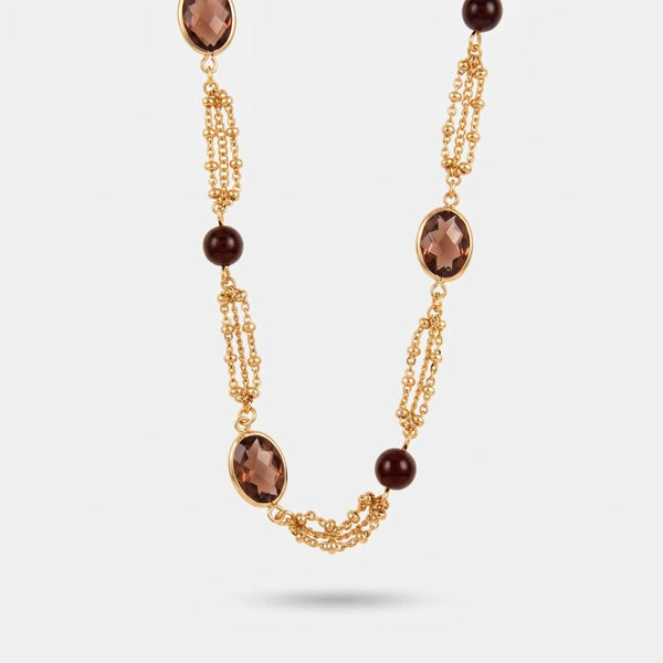 Collana in Metallo cristalli marroni e elementi dorati - BYSIMON gioielli